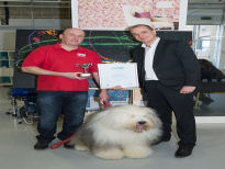 Adrian receiving his award (3) with the Dulux Dog